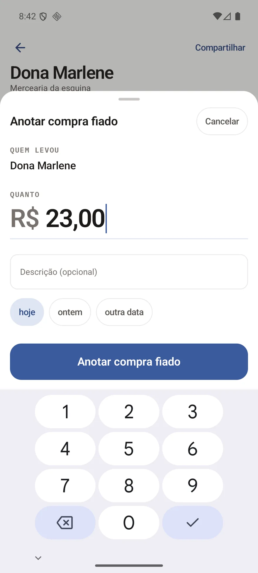 A folha de anotar uma compra, com o teclado numérico aberto